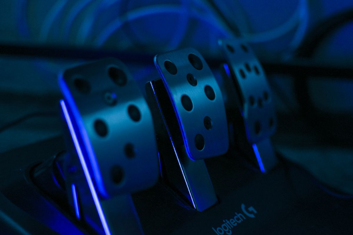 Illuminated racing pedals glowing blue